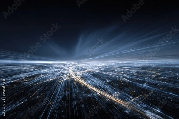 Fototapeta Aerial view of a city at night, with light trails