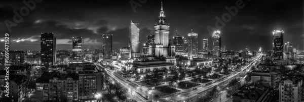Fototapeta Panoramic view of a city at night