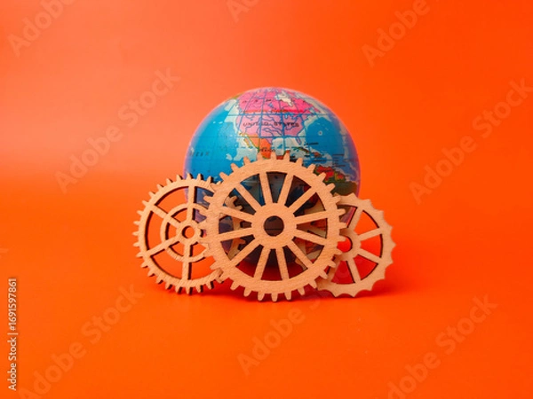 Fototapeta This image visually represents the concept of global interconnectedness and the mechanisms driving it