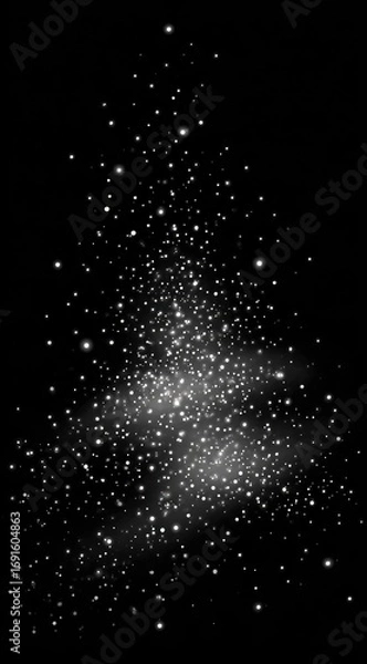 Fototapeta A dense cloud of sparkling dust or glitter particles against a solid black background, suggesting a magical or ethereal effect with varying light intensities