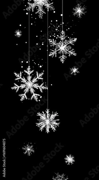 Fototapeta A cascade of luminous white snowflakes descends against a stark black background, adorned with scattered sparkles, evoking winter's magical allure