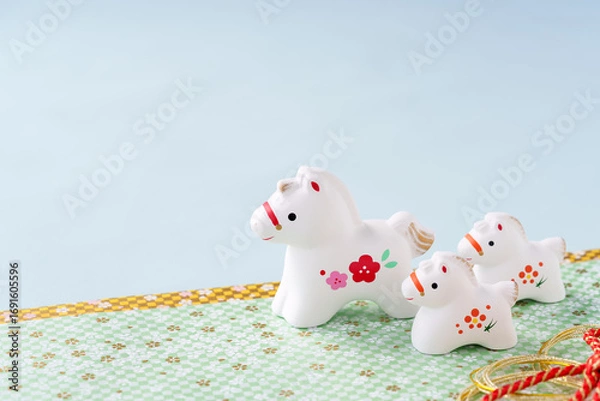 Obraz 午年の年賀状素材｜白馬の親子ブルー背景