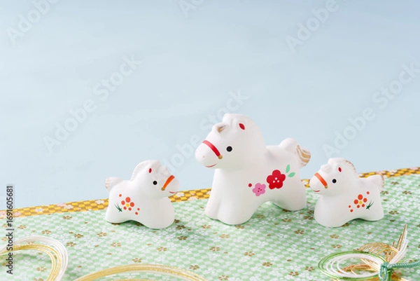 Obraz 午年の年賀状素材｜白馬の親子ブルー背景