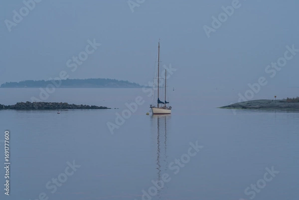 Fototapeta Sails down, night falls in blue