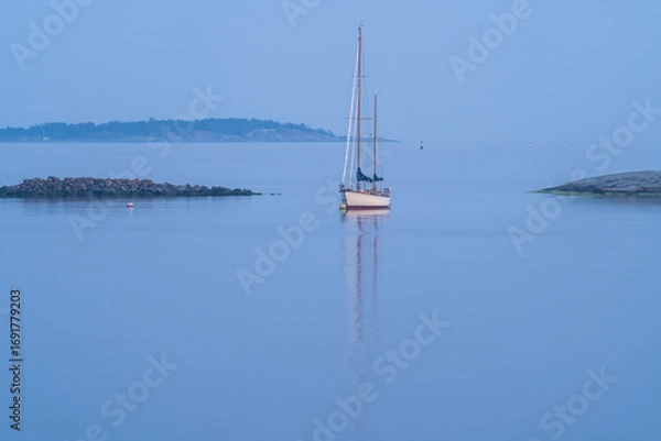 Fototapeta Sails down, night falls in blue