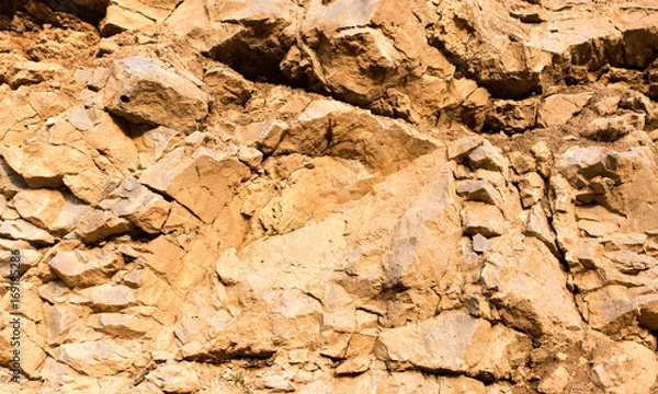 Fototapeta Stone cliffs in the mountains as a background