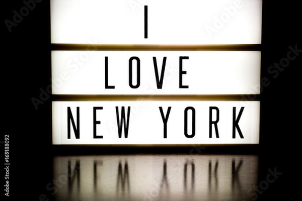 Fototapeta A light up board displaying the phrase I LOVE NEW YORK