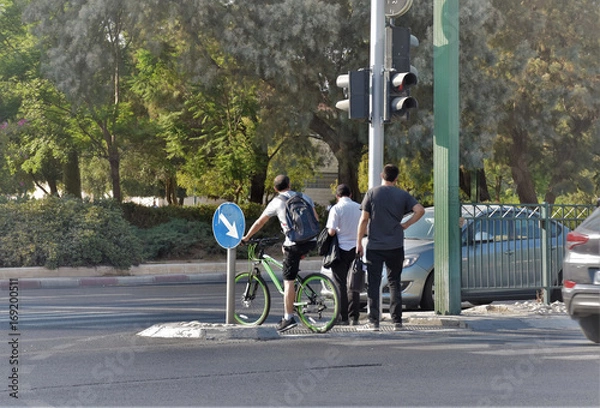 Obraz man are waiting on the triffic light