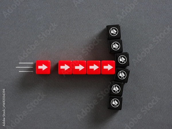 Fototapeta Red arrow dice facing opposite direction of black no sound dice, different opinions concept