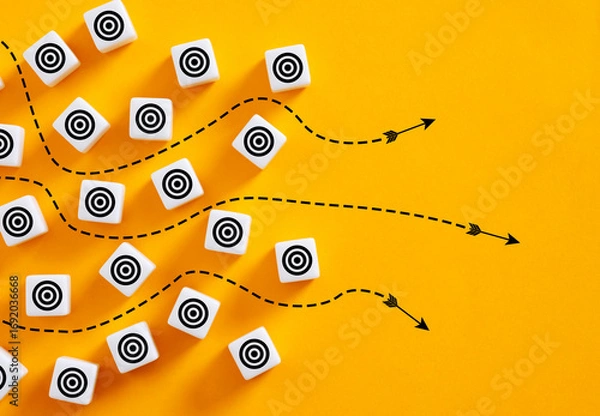 Fototapeta Arrows pointing different targets on yellow background representing alternative strategies
