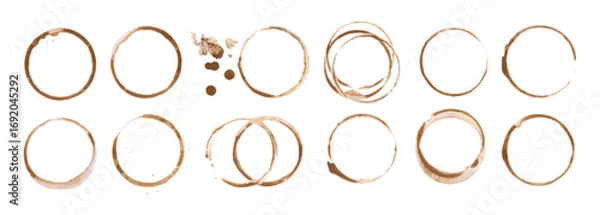 Fototapeta Coffee cup or tea stain drink ring vector illustration set isolated on white background. Coffee stain mark trace ring cup spot trace. Brown round splashes of drink collection.