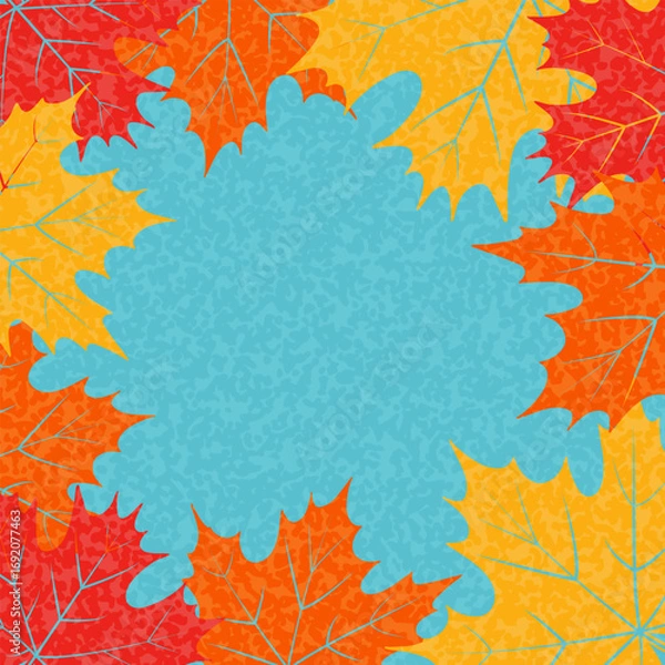Fototapeta Autumn background with bright leaves. Yellow and red fall leaf on blue backdrop