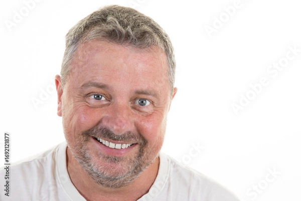 Fototapeta portrait of smiling man handsome blue eye in white shirt bearded middle aged guy happy smile posing over white background aside empty copy space	
