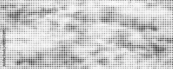 Fototapeta Abstract black and white halftone dot pattern texture. Retro comic style dotted background, perfect for pop art design, poster, banner, or digital template.