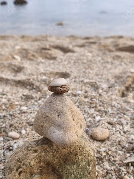 Fototapeta photo of piles of rocks and seashells
