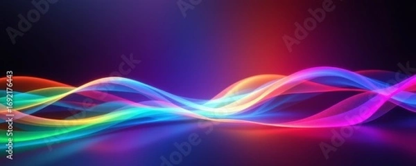 Fototapeta The image features a vibrant display of multicolored light waves swirling across a dark background, creating an abstract and dynamic scene