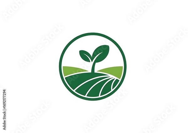 Fototapeta Green sprout growing in a cultivated field within an oval shape logo
