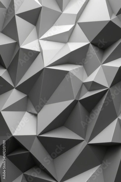 Fototapeta The image features a geometric pattern composed of numerous three dimensional triangular facets arranged in a seemingly random, yet coherent design