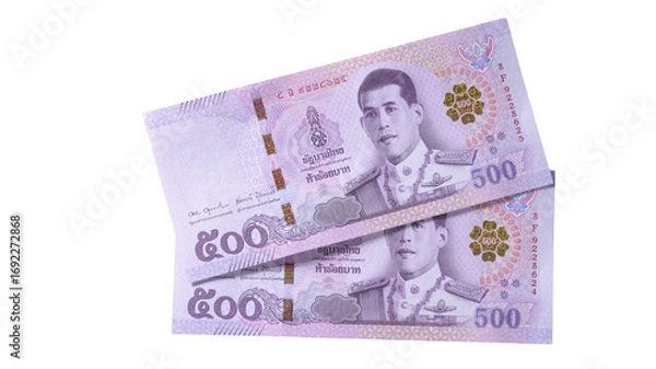 Fototapeta Hands counting banknotes in a dimly lit room showcasing cash currency exchange activity at night