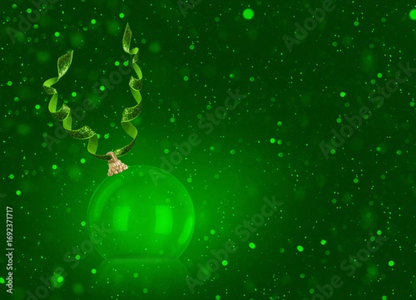 Obraz Abstract New Year decoration, ball on a green background with bokeh