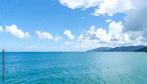 Fototapeta Panoramic view of a tranquil ocean and sky