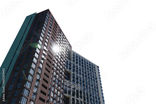Fototapeta A low-angle view of a modern high-rise apartment building isolated on a transparent background with a bright sun flare