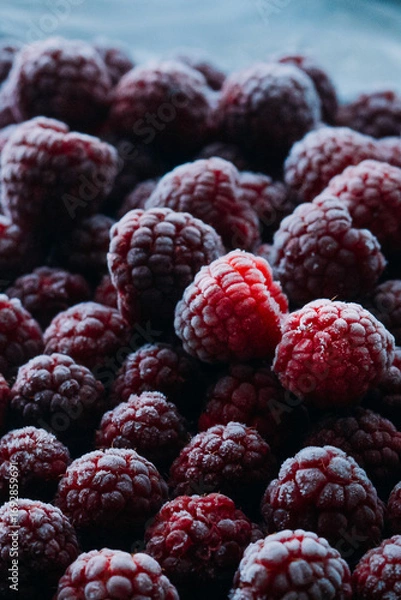 Fototapeta frozen raspberries ice background