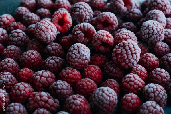 Fototapeta frozen raspberries ice background