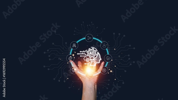 Fototapeta Hand holding holographic AI interface with human head and digital circuit icons. Concept artificial intelligence, machine learning, automation, data innovation, cognitive technology, future business.