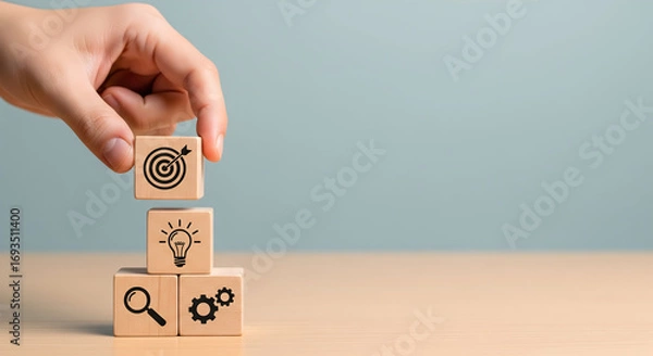 Fototapeta Building strategic success placing target, idea, and gears blocks for business growth
