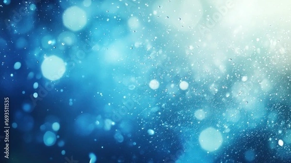 Fototapeta Abstract blue background featuring bokeh effects and glistening droplets patterns