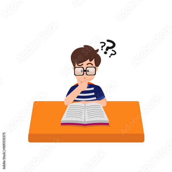 Fototapeta A boy with a glasses reads a book at his desk with a puzzled expression