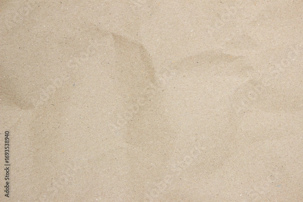 Fototapeta Old paper vintage texture surface for background. Brown paper crumpled texture, Cream color recycled kraft paper texture blank with copy space for text.	