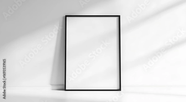 Obraz Blank Black Framed Poster on White Wall.