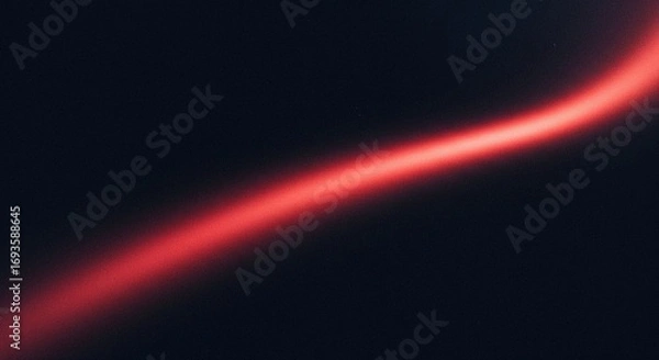 Fototapeta The Abstract Flow of a Vibrant Red Light Across the Deep Dark Background