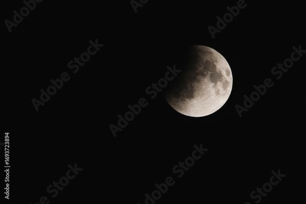 Fototapeta Moon partial eclipse. Lunar Eclipse on Sep 8, 2025. Chiang Mai Thailand