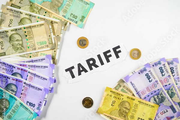 Fototapeta Stacks of Indian Currency with Coins Showcasing Financial Concept and Tariff