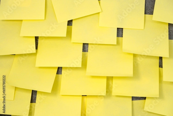 Fototapeta Multiple sheets sticky notes on the wall