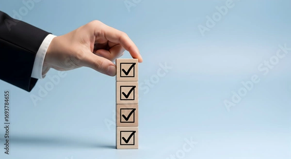 Fototapeta Achieve success by completing checklist with wooden blocks, shows goals completed and business success