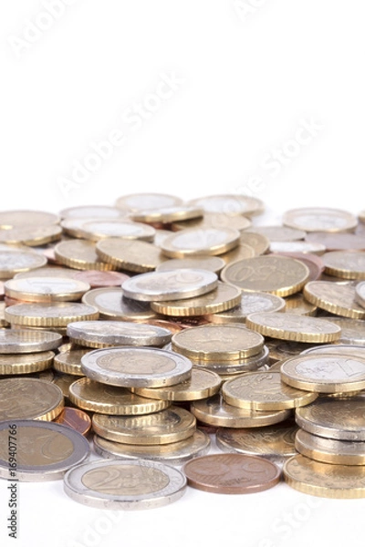 Obraz Many euro coins on white background.