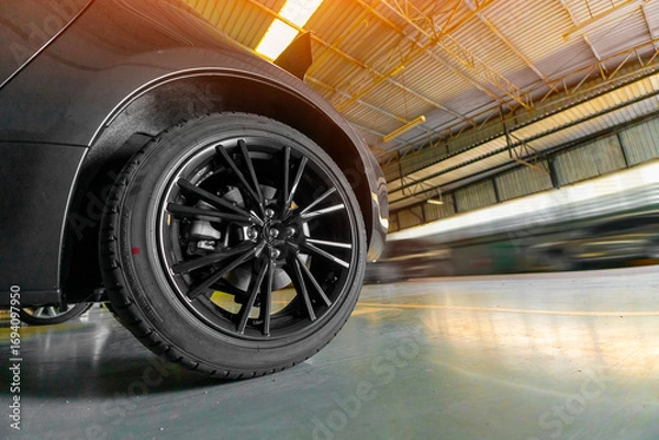 Fototapeta Car wheels and tires are vital for safety and performance. Regular inspection of pressure, tread, balance, and alignment ensures smooth driving, prevents wear, and extends vehicle life.