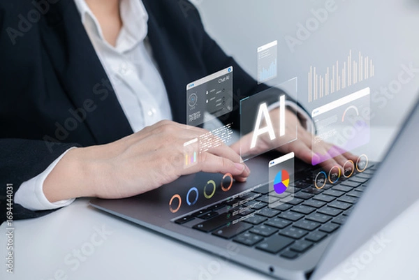 Fototapeta AI-powered analytics concept as businesswoman uses laptop with virtual dashboards and data visualizations, representing artificial intelligence, data processing, and smart business insights.