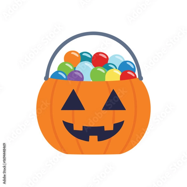 Obraz Orange jackolantern bucket filled with colorful candies and treats halloween pumpkin