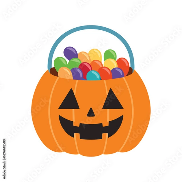 Fototapeta Orange pumpkin basket filled with colorful candies and a blue handle jack o lantern