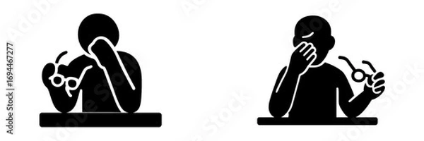 Fototapeta Black glyph icon of a tired person with eye strain taking off glasses and rubbing eyes from overwork or fatigue