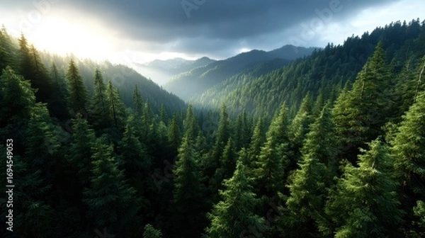 Fototapeta An extraordinary view of majestic mountains under a stunning twilight sky, revealing layers of green and blue hues that inspire awe and connect viewers with nature's grandeur.