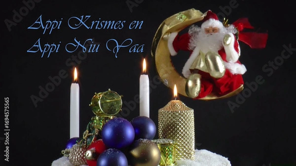 Fototapeta Warm Wishes for Christmas Joy 
A festive card with candles, baubles, and Santa Claus in the language Krio 
