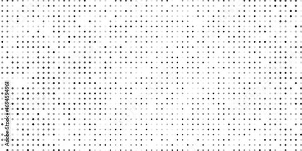 Fototapeta Abstract dotted halftone gradient texture. Vanishing polka dot background art modern design