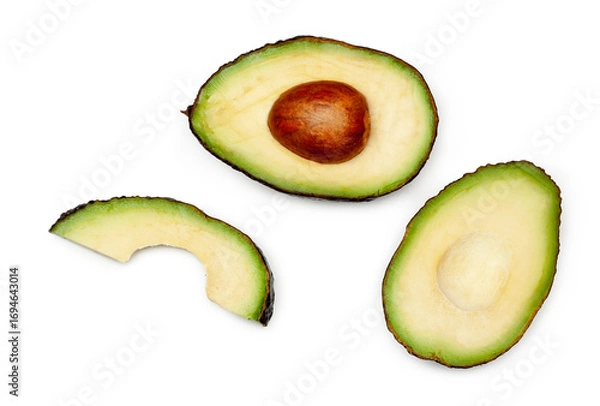 Fototapeta Avocado slices isolated on a white background, contour