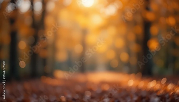 Fototapeta Experience vibrant autumn warmth with this dreamy bokeh landscape, perfect for adding fall ambiance to designs